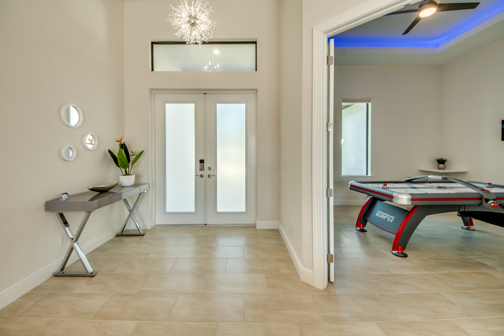 Hallway with a gaming room in Villa Aesthetic