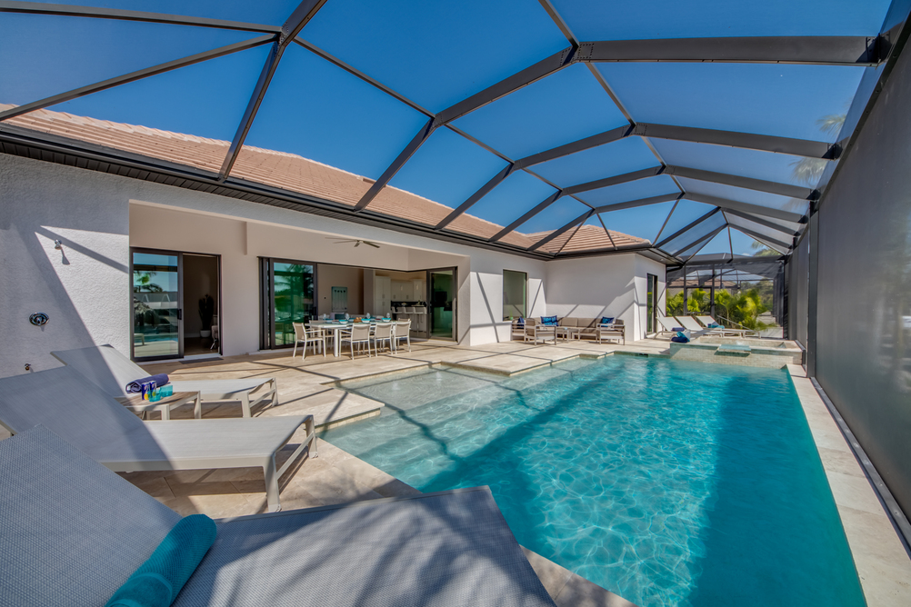 Pool with loungers in the Villa Aesthetic